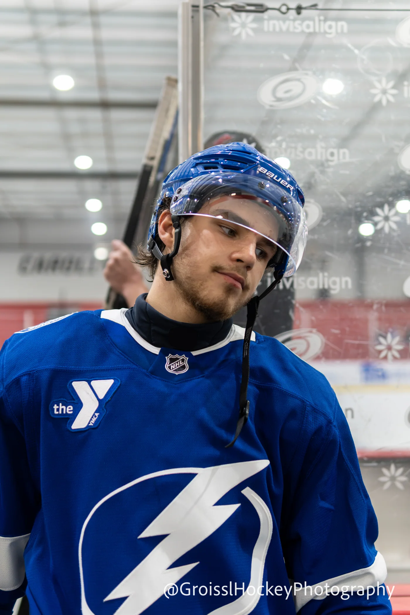 Close portrait of a Tampa Bay Lightning prospect near the bench