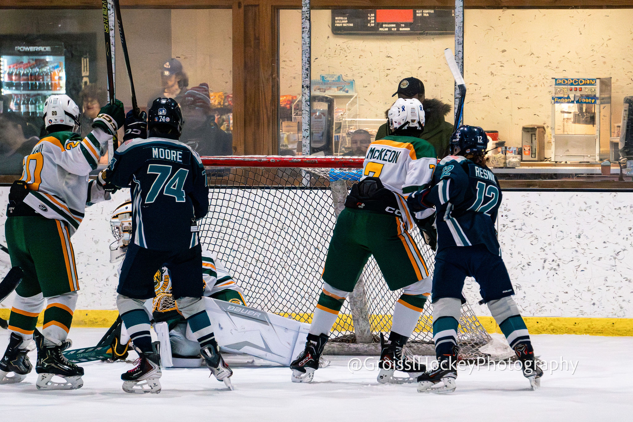 Jr. Seahawks skater driving through the neutral zone in Raleigh game action